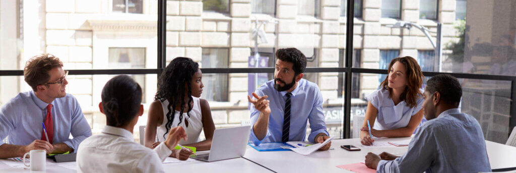 Corporate business team and manager in a meeting, close up